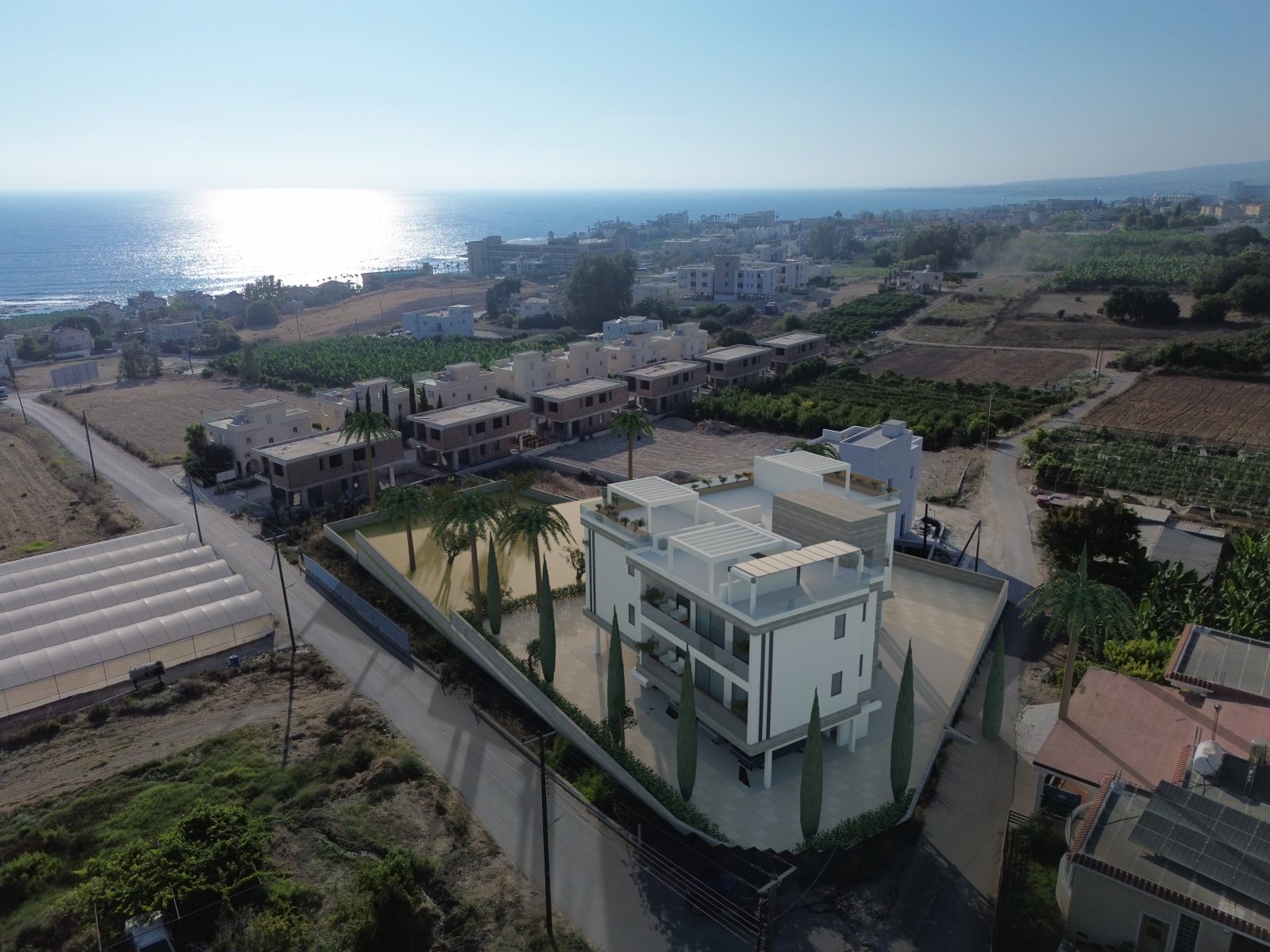 Real drone photo of the plot with Sea Breeze shown in place, sea behind